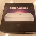 Apple Airport Time Capsule 802.11N Wi-fi Hard Drive 1TB (1ST Gen) (MB277LL/A). Fixed Price $49.99.