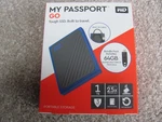New Wd My Passport Go External Ssd, 1TB, W/ Sandisk 64GB Usb 3.0 Flash Drive. Fixed Price $149.98.