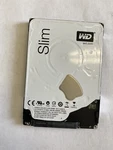 Western Digital Mobile Blue WD10SPCX 1TB 2.5" Sata Iii Laptop Hard Drive. Fixed Price $49.99.