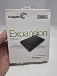 Slim Seagate Expansion 1TB Memory Hard Drive Portable Usb 3.0 Model SRD00F1. Fixed Price $55.00.