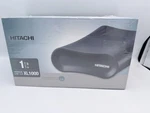 Hitachi HXSDNB10001BBB TB,EXTERNAL,7200 Rpm (0S02484) Hard Drive New Sealed. Fixed Price $59.00.