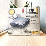 Iomega Zip New Parallel Port External Sealed 3 In One 10012. Fixed Price $174.99.