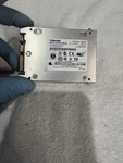 Toshiba THNS256GG8BBAA 256GB 2.5" Solid State Drive. Fixed Price $29.99.