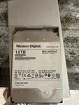 12TB Western Digital White Label Hard Drive WD120EMFZ Nas 256MB 5400RPM 3.5". Fixed Price $244.00.