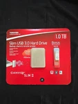 Toshiba Canvio Slim Ii 1.0 Tb Portable Hard Drive/w Bonus 16GB Usb Flash. Fixed Price $70.00.