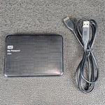 Western Digital My Passport Ultra 1TB USB3.0 Portable Hard Drive WDBZFP0010BBK. Fixed Price $39.99.
