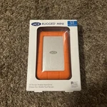 Lacie Rugged Mini 5TB All-terrain Mobile Hard Drive 130MB/S (STJJ5000400). Fixed Price $150.00.