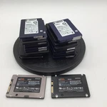 Lot Of 14 Assorted 2.5" Ssds 256GB Samsung Micron Sandisk. Fixed Price $500.00.