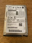 500GB Fujitsu 2.5" Sata Laptop Hard Drive MJA2500BH. Fixed Price $35.93.