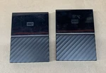 Lot Of Western Digital My Passport External Drive WDBYFT0020BBK-0A *read*. Fixed Price $75.99.