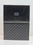 Western Digital My Passport WDBFKF0010BBK-WESE 1TB Portable External Hard Drive. Fixed Price $35.00.