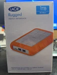 New & Sealed Lacie Rugged Triple 1TB Drive Usb Firewire. Fixed Price $89.99.