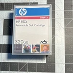 Hp Rdx Removable Disk Cartridge 320GB Clear Storage Format Q2041A. Fixed Price $75.00.
